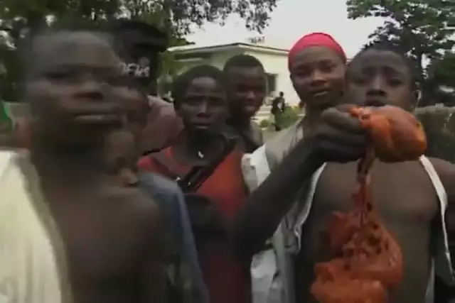 Warning Graphic Content - African Cannibalism Going On Right Now (Eating the looters)